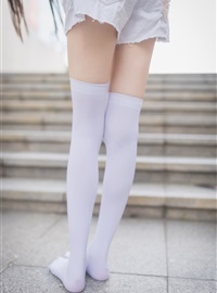 Rabbit plays with painted white stockings over the knee(38)